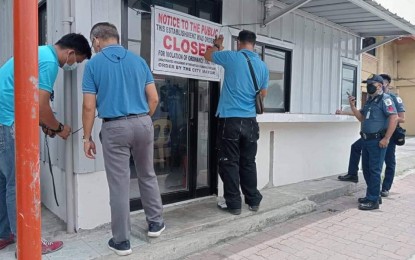 <p><strong>CLOSED</strong>. A closure order is served on a water refilling station in Iloilo City for operating without business and sanitary permits. The local government has ordered the closure of water refilling stations with no permits following the acute gastroenteritis and cholera outbreak in the city. <em>(Photo courtesy of Iloilo City Investment Services Business Permits and Licensing Division)</em></p>