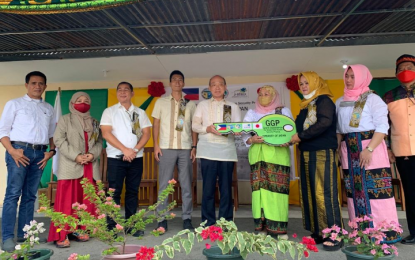 <p><strong>JAPAN’S GENEROSITY.</strong> Consul General Ishikawa Yoshihisa of the Consulate-General of Japan in Davao and First Secretary Okada Fumikai of the Embassy of Japan in the Philippines lead the turnover of two buildings with seven classrooms to Bayanga Norte Elementary School officials in Matanog, Maguindanao on Aug. 31, 2022. Japan donated the PHP8.9 million school buildings through the Japanese government’s Grant Assistance for Grass-Roots Human Security Projects. <em>(Contributed photo)</em></p>