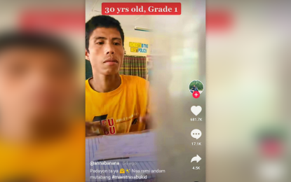 <p><strong>EAGER TO LEARN.</strong> Rizalde Bisalona, 30, from Glan, Sarangani, inspired netizens after enrolling as a Grade 1 student Tamala Elementary School for the school year 2022-2023. An online video post on Bisalona being interviewed by his teacher on Sept. 2, 2022 has gathered more than five million views to date. <em>(Screengrab from Anne Patigayon - Department of Education Sarangani)</em></p>