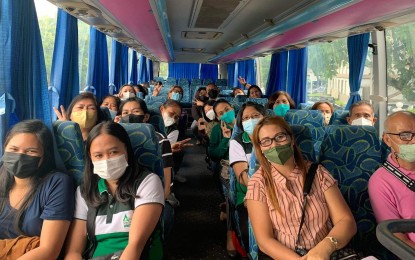 <p><strong>CUT IN TRAVEL EXPENSES</strong>. Employees of the Negros Occidental provincial government avail of a free ride to work in this undated photo. On Wednesday (Sept. 7, 2022), Provincial Administrator Rayfrando Diaz II said that every month, each employee enjoys a savings of about PHP2,000 since the service started last July. <em>(Photo courtesy of PIO Negros Occidental)</em></p>
