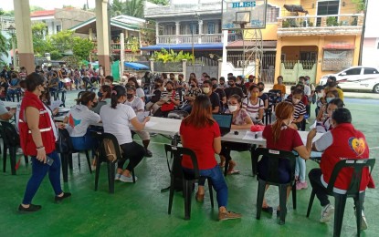 <p><strong>FINANCIAL HELP</strong>. The release of educational assistance to students in Catbalogan City, Samar in this Sept. 3, 2022 photo. At least PHP31.26 million in educational assistance has been released by the Department of Social Welfare and Development to 12,670 poor students in Eastern Visayas in the past three weeks. <em>(Photo courtesy of DSWD Region 8)</em></p>