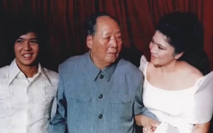 <p><strong>LESSONS LEARNED.</strong> A young Ferdinand Marcos Jr. (left) and his mother, then First Lady Imelda Marcos, flank Chinese revolutionary leader Mao Zedong during a visit to China in September 1974. Marcos said he learned a lot from joining the state visits of his late father and former president, Ferdinand E. Marcos Sr. <em>(Courtesy of BBM Facebook)</em></p>