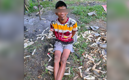 <p><strong>ARRESTED DRUG SUSPECT.</strong> Drug suspect Vincent Delos Reyes was unharmed following a shootout that resulted in the death of William Dionisio, a suspected drug dealer on Sunday (Sept. 11, 2022) in Barangay Bunguiao, Zamboanga City. The suspect, together with his slain cohort, are allegedly involved in selling illegal drugs in the village.<em> (Photo courtesy of Zamboanga City Police Office)</em></p>