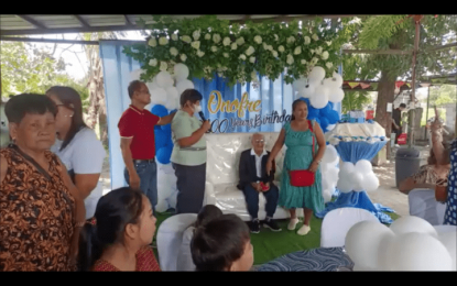 <p><strong>CENTENARIAN</strong>. Onofre Buan Bugay Sr., a World War II veteran, celebrates his 100th birthday in a resort in Samal, Bataan on Monday (Sept. 12, 2022). Bugay, a resident of Barangay Sta. Lucia of the said town, is currently Vice District I commander of WWII veterans from the towns of Dinalupihan, Hermosa, Orani, Samal, Abucay, and Morong. <em>(Photo by Ernie Esconde)</em></p>
