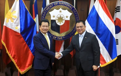 <p>DND officer-in-charge Undersecretary Jose Faustino Jr. (right) and Thai Ambassador to Manila Tull Traisorat (left)<em> (Photo courtesy of DND)</em></p>
