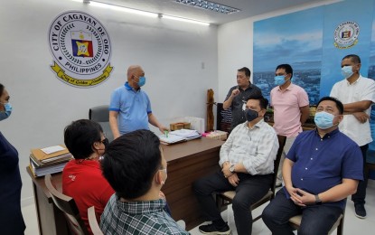 <p><strong>TELCO DEV’T.</strong> Cagayan de Oro City Mayor Rolando Uy (center) meets with representatives of Smart and PLDT telecommunication firms Wednesday (Sept. 14, 2022). The telco officials shared with the mayor their plans to add satellite towers in rural barangays of the city. <em>(Photo courtesy of Mayor Uy Facebook page)</em></p>