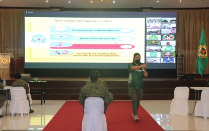<p><strong>MENTAL HEALTH FIRST.</strong> Army General Hospital psychologist Marilyn Payumo shares mental health first aid tips during the mental health first aid and gender-based violence response training held onsite and virtually at the Philippine Army Officers Clubhouse in Fort Bonifacio, Metro Manila on Sept. 12, 2022. The activity was held in line with PA chief Lt. Gen. Romeo Brawner Jr.'s thrust of looking after the mental well-being of troops. <em>(Photo courtesy of Philippine Army)</em></p>