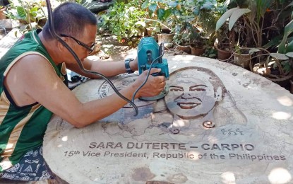 CDO artist's woodwork features VP Sara