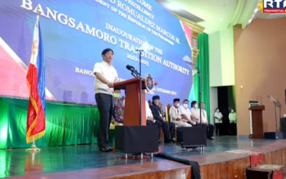 <p><strong>BANGSAMORO DEV’T.</strong> President Ferdinand “Bongbong” Marcos Jr. delivers his keynote speech during the ceremonial opening of the Bangsamoro Transition Authority (BTA) Parliament session in Cotabato City on Thursday (Sept. 15, 2022). Marcos urged the BTA to pass legislative measures that would bring progress to the Bangsamoro region. <em>(Screengrab from RTVM)</em></p>