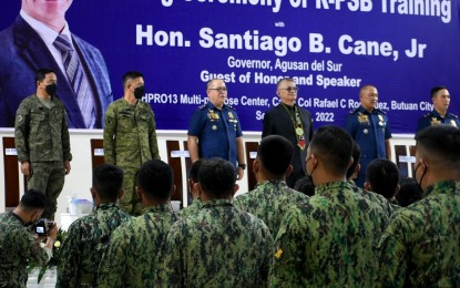 <p><strong>VILLAGE-BASED COPS.</strong> At least 291 police personnel in the Caraga Region complete a 15-day specialized training Wednesday (Sept. 14, 2022), as part of the revitalized “Pulis sa Barangay” program aimed at thwarting communist recruitment in various areas of the region. The graduation ceremony was led by PRO-13 Director Brig. Gen. Romeo Caramat Jr. (2nd from right) and Agusan del Sur Gov. Santiago Cane Jr. (3rd from right) who served as the guest of honor and speaker. <em>(Photo courtesy of PRO-13)</em></p>