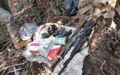 <p><strong>RECOVERED.</strong> Photo shows the recovered arms cache belonging to the New People's Army (NPA)-Komiteng Larangang Guerrilla-Tarlac-Zambales in Barangay Maasin, San Clemente, Tarlac on Thursday (Sept. 15, 2022). The firearms and ammunition were discovered following a tip from a concerned citizen. <em>(Photo courtesy of the Army's 7ID)</em></p>