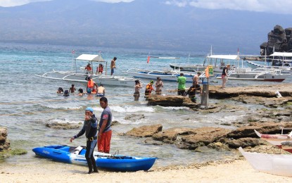 <p><strong>TOURIST DESTINATION</strong>. Apo Island in Dauin town, Negros Oriental (shown in this undated photo) is among the most preferred tourist attractions in the province. This year, a report from the Department of Tourism in Region 7 showed an increase in both foreign and domestic tourist arrivals in the province. <em>(PNA file photo by Judy Flores Partlow) </em></p>