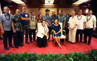 <p>First Lady Liza Araneta-Marcos (seated, right) with former Palace employees. <em>(Photo from First Lady Liza Araneta-Marcos' official Facebook page)</em></p>