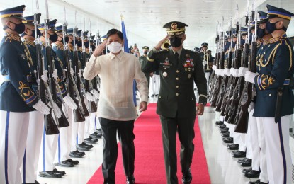 <p><strong>DEPARTURE HONOR</strong>. President Ferdinand “Bongbong” Marcos Jr. receives departure honor at the Ninoy Aquino International Airport (NAIA) in Pasay City on Sunday (Sept. 18, 2022). Marcos will deliver the Philippine national statement at the 77th United Nations General Assembly in New York. <em>(PNA photo by Avito Dalan)</em></p>
