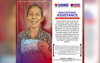 <p><strong>EDUCATIONAL AID.</strong> Albina Cabel, 74, shows the PHP2,000 educational aid she received from the Department of Social Welfare and Development for her grade-schooler grandchild on Sept. 17, 2022. Cabel says she will use the money to buy her grandchild's educational needs.<em> (Photo courtesy of DSWD-11)</em></p>