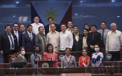 <div><strong>CONFIRMED.</strong> Department of Labor and Employment Secretary Bienvenido Laguesma (6th from left, 2nd row) hurdles his Commission on Appointments hearing at the Senate on Tuesday (Sept. 20, 2022). Senators said his two-decade service in the labor sector makes him perfect for the job. <em>(PNA photo by Avito Dalan)</em></div>