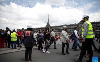 <p>People gather in the Zocalo Square after an earthquake in Mexico City, Mexico on Sept. 19, 2022. An earthquake with a magnitude of 7.4 shook Mexico on Monday, according to preliminary data, with further details unavailable at the moment.<em> (Xinhua/Francisco Canedo)</em></p>