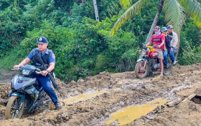 <p><strong>MUDDY ROAD</strong>. A muddy road in Palapag, Northern Samar will be paved through the Support to Barangay Development Program in 2023. At least PHP10.4 million budget will be poured out to each of the five formerly conflict-stricken communities in Palapag, Northern Samar in 2023, the Department of the Interior and Local Government said on Wednesday (Sept. 21, 2022).<em> (Photo courtesy of DILG)</em></p>