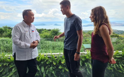 <p><strong>HISTORIC PLAN</strong>: Top Filipino pole vaulter EJ Obiena (center) talks to Philippine Olympic Committee President Abraham Tolentino about his plan to hold a tournament featuring his fellow world-class athletes in Tagaytay City next year. With Obiena is his girlfriend, German long jumper Caroine Joyeaux. <em>(Contributed photo)</em></p>