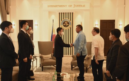 <p>Department of Justice officials and Chinese officials meet on the repatriation of POGO workers. <em>(Photo from DOJ PIO) </em> </p>