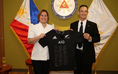 <p><strong>BILATERAL TIES</strong>. Vice President Sara Duterte receives a jersey from New Zealand Ambassador Peter Kell, with the signatures of their National Rugby Union Team, during his courtesy call on Wednesday (Sept. 22, 2022). Their discussion included the strengthening of the bilateral relations between the Philippines and New Zealand. <em>(Photo courtesy of Office of the Vice President)</em></p>