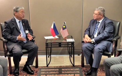 <p>Foreign Affairs Secretary Enrique Manalo and Malaysian Foreign Minister Dato’ Sri Saifuddin Bin Abdullah during a meeting on the sidelines of the 77th UNGA in New York.<em> (Photo courtesy of DFA)</em></p>