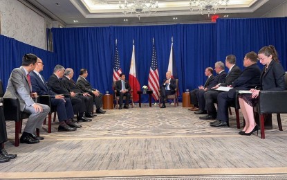 <p>President Ferdinand Marcos Jr. (left, seated center) and US President Joe Biden, flanked by their official delegations <em>(Courtesy of Office of the President)</em></p>