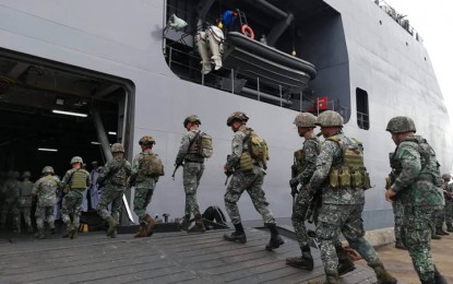 <p><strong>MARINE TROOPS.</strong> The remaining troops of the 4th Marine Brigade and Marine Battalion Landing Team-8 depart here Friday (September 23, 2022) completing their pullout from southern Philippines and deployment to the northern frontier of the country. They boarded BRP-Davao del Sur after a send-off ceremony held at the port of Zamboanga.<em> (Photo by: Teofilo P. Garcia Jr.)</em></p>