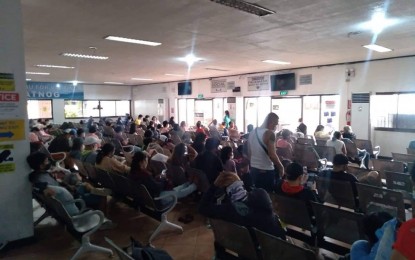 <p><strong>STANDBY.</strong> Passengers bound for Catanduanes and Masbate and some areas in the Visayas and Mindanao regions are stranded at Matnog Port in Sorsogon on Sunday (Sept. 25, 2022). A no sail policy is in effect due to the threat of Super Typhoon Karding. <em>(Courtesy of Achilles Galindo-PPA Matnog)</em></p>