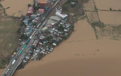 <p><strong>FLOODED AREAS</strong>. Some areas are still flooded following the onslaught of weakened Typhoon Karding, as shown in an aerial shot during the inspection of President Ferdinand Marcos Jr. on Monday (Sept. 26, 2022). Marcos said the power supply in some areas in Nueva Ecija and Aurora provinces has yet to be restored.<em> (Photo courtesy: FB/President Bongbong Marcos)</em></p>