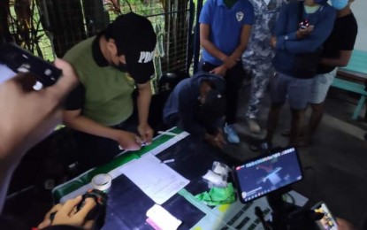 <p><strong>DRUG BUST</strong>. A personnel of the Philippine Drug Enforcement Agency-Negros Occidental Provincial Office conducts an inventory of the PHP1.02 million suspected shabu seized during an inspection at the Bredco port in Bacolod City on Sunday afternoon (Sept. 25, 2022). The suspect, Rhemhon Sonza Dumancas, was bound for Iloilo when he was intercepted by joint anti-drug operatives. <em>(Photo courtesy of PDEA-Western Visayas)</em> </p>