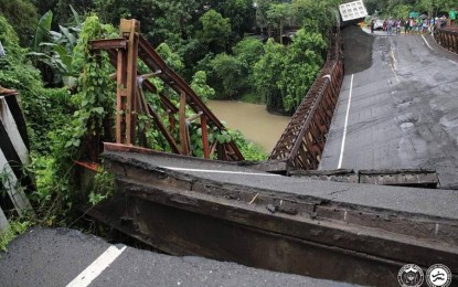 <p><strong>COLLAPSED BRIDGE</strong>. A steel bridge at the boundary of Barangays Buhang, Hamtic and Egaña in Sibalom, Antique collapses after a 10-wheeler truck loaded with quarry materials passed by around 3 a.m. on Monday (Sept. 26, 2022). Sibalom Municipal Disaster Risk Reduction and Management Officer Joel Odango said in an interview that the bridge capacity was only 10 tons, but the truck was carrying around 30 tons of sand and gravel. <em>(Photo courtesy of Antique PIO) </em></p>