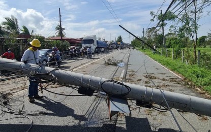 <p><strong>RESTORATION.</strong> The technical team of the Nueva Ecija Electric Cooperative, Inc. starts to repair the lines damaged by the onslaught of Super Typhoon Karding on Tuesday (Sept. 27, 2022). Most parts of the province still have no electric power supply since it was cut off last Sunday.<em> (Photo courtesy of NEECO 1)</em></p>
