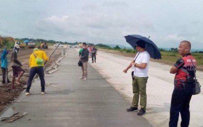 <p><strong>AIRPORT IN THE SOUTH</strong>. Kabankalan City Mayor Benjie Miranda (2nd from right) inspects the construction of the city’s airport runway earlier this month. On Tuesday (Sept. 27, 2022), Sixth District Provincial Board Member Jeffrey Tubola said the Department of Transportation has proposed the inclusion of PHP855 million in the 2023 national budget for the completion of the project. <em>(Photo courtesy of Mayor Benjie Miranda Facebook page)</em></p>