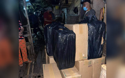 <p><strong>RECOVERED CIGARETTES.</strong> Police officers separately recover PHP1.6 million worth of smuggled cigarettes in Monday night (Sept. 26, 2022) abandoned in separate areas in Zamboanga City. No one was arrested, as the suspected smugglers fled the scene before the authorities arrived.<em>(Photo courtesy of Zamboanga City Police Office)</em></p>