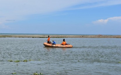 <p><strong>SEARCH AND RESCUE</strong>. Search and rescue teams scour the coastal waters off Barangay 34-B Gabu Norte in Laoag City to look for a missing fisherman on Wednesday (Sept. 28, 2022). A helicopter from the Office of the Civil Defense has been requested to help in the operation. <em>(Photo courtesy of Laoag City)</em></p>