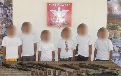 <p><strong>TIRED REBELS</strong>. Six members of the New People’s Army (NPA) Platoon Banglas, Sub-Regional Committee 3, North Central Mindanao Regional Committee operating in Agusan del Sur surrender to the Army’s 26th Infantry Battalion on Sept. 25, 2002. The Police Regional Office in the Caraga Region also reported the surrender of four members of dismantled NPA Guerrilla Front 4A to police units on Sept. 26, 2022. <em>(Photo courtesy of 26IB)</em></p>