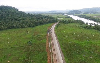 <p><strong>NEW ROAD</strong>. A portion of the PHP1.12 billion Samar Pacific Coastal Road project in Northern Samar. The Korean government-funded project has already opened and concreted 8.25 kilometers out of the 11.6-kilometer road stretch after four years of construction.<em> (Photo courtesy of the Department of Public Works and Highways)</em></p>