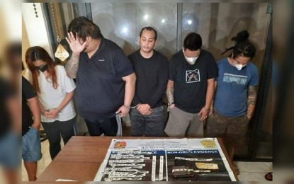 <p><strong>WASTED.</strong> Actor Dominic Roco (center), 33, and his four companions are arrested during a drug buy-bust operation in Barangay Holy Spirit, Quezon City early Saturday morning (Oct. 1, 2022). They were caught with PHP112,000 worth of suspected shabu and PHP14,000 worth of dried marijuana. <em>(Courtesy of Bernard Jaudian/PTV)</em></p>