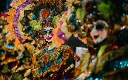 <p><strong>FESTIVAL KICKOFF.</strong> Dancers in colorful costumes entertain the crown during the countdown for the official start of the 43rd Masskara Festival at Government Center grounds close to midnight Friday (Sept. 30, 2022). The main events on October 22 and 23 will feature the Electric MassKara float and dance showdown and the street and arena dance competition, respectively. <em>(Courtesy of Bacolod City-PIO)</em></p>