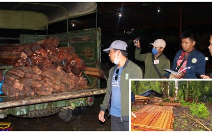 <p><strong>HOT LOGS.</strong> Members of the BARMM environment office do an inventory of seized forest products of the Lauan variety abandoned in a sawmill during an operation by Marines and police in Barangay Nabalawag, Barira, Maguindanao on Sunday (Oct. 2, 2022). The seized forest products (inset) have an estimated value of PHP1.6 million. <em>(Photo courtesy of MBLT-5)</em></p>