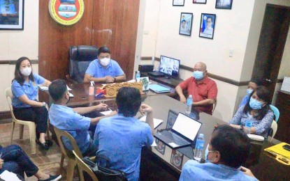<p><strong>SAFE DRINKING WATER</strong>. Mayor Marvin Malacon (seated, center) of E. B. Magalona, Negros Occidental convenes the Local Drinking Water Quality Monitoring Committee on Monday (Oct. 3, 2022) to address water safety and quality after a cholera case was recorded in the town last week. As of Monday, Negros Occidental has seven confirmed cases of cholera in three neighboring localities in the northern part of the province. <em>(Photo courtesy of E.B. Magalona, Negros Occidental PIO)</em></p>