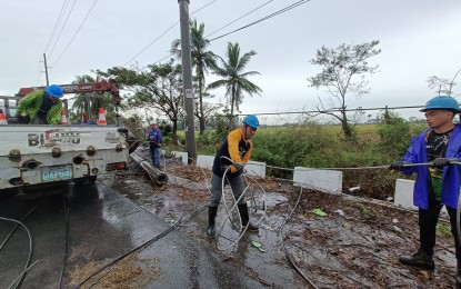 <p><strong>POWER RESTORATION</strong>. The technical team from Ilocos Norte Electric Cooperative, Inc. joins in restoring power supply in some areas in Gapan City, Nueva Ecija on Monday (Oct. 3, 2022).  Some areas in Nueva Ecija are still without electricity due to the onslaught of Super Typhoon Karding. <em>(Photo courtesy of Nueva Ecija I Electric Cooperative, Inc.)</em></p>