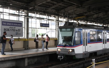 <p>An MRT-3 train arriving at Quezon Avenue Station. <em>(PNA file photo)</em></p>