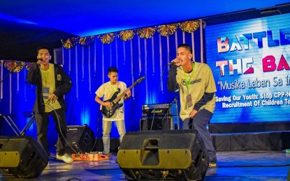 <p><strong>MUSIC VS. INSURGENCY</strong>. Artists performing during a competition in Tacloban City on Oct. 3, 2022. The city police office here is raising the youth’s awareness of the deceptive recruitment of the New People’s Army through music.<em> (Photo courtesy of Tacloban city police)</em></p>