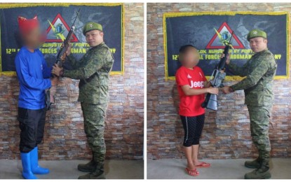 <p class="p1"><span class="s1"><strong>SURRENDERERS.</strong> A couple signifies their exit from the communist New People’s Army in simple rites to military authorities in Lake Sebu, South Cotabato. The couple said they feared for their lives due to ongoing military operations against the communist rebels in the province. <em>(Photo courtesy of Army’s 5SFB)</em></span></p>