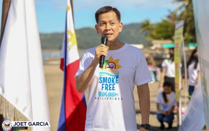 <p><strong>NO SMOKING</strong>. Governor Jose Enrique Garcia III delivers his message during the launch of the smoke-free beaches program in Bagac town, Bataan province on Tuesday (Oct. 4, 2022). Garcia said the program is in line with the provincial government’s goal of promoting a healthy community while safeguarding the environment.<em> (Photo courtesy of 1Bataan)</em></p>
