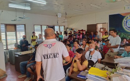 <p><strong>CASH INCENTIVE</strong>. Coconut farmers in Barangay Trinidad in Guihulngan City, Negros Oriental province listen to updates from a member of the Task Force to End Local Communist Armed Conflict. The farmers, belonging to the <em>Kapunungan sa Makugihong Mag-uuma sa Trinidad</em> (KMMT) Association, received PHP225,000 as incentive to help them plant coconut trees. <em>(Photo courtesy of the 62IB/Philippine Army) </em></p>