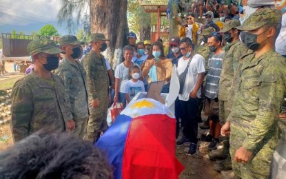 <p><strong>LAST RESPECTS</strong>. Troops of the Philippine Army’s 62nd Infantry Battalion pay their last respects to CAFGU Active Auxiliary member Joselito Raboy, who was laid to rest at the public cemetery of Moises Padilla town, Negros Occidental province on Oct. 2, 2022. Raboy, 40, was gunned down by four New People’s Army rebels after leaving his patrol base on Sept. 24. <em>(Photo courtesy of 62nd Infantry Battalion, Philippine Army)</em></p>