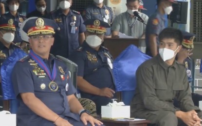 <p>PNP chief Gen. Rodolfo Azurin Jr. (left) and presidential son William Vincent Marcos (right) <em>(Screengrab from PNP Facebook live video)</em></p>
